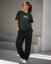 Rise With Purpose dark green Sorona t-shirt with crew neck and short sleeves, featuring a white logo graphic on the chest.